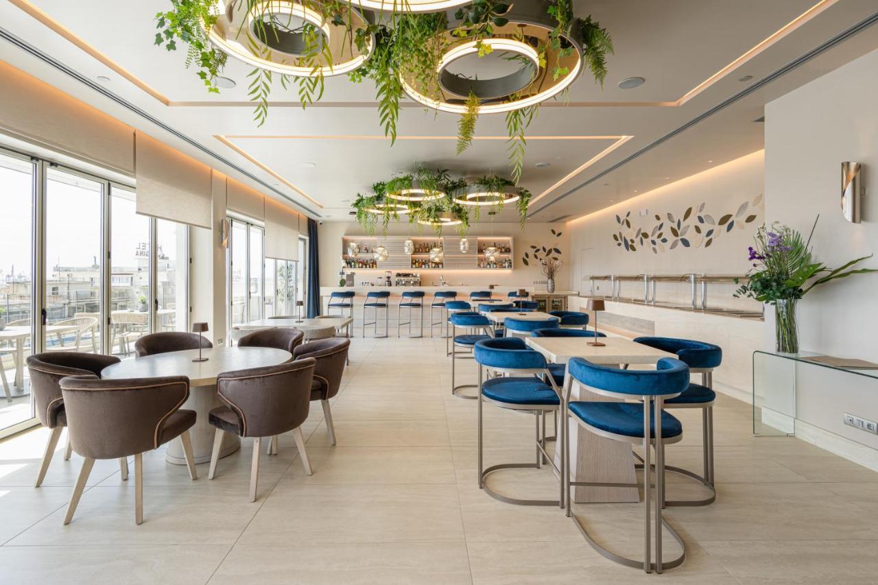 Holiday Inn Thessaloniki By Ihg Kültér fotó The Club lounge at Tel Aviv airport